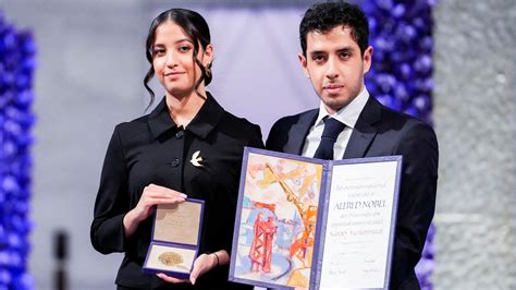 Children of imprisoned Iranian activist Narges Mohammadi accept the Nobel Peace Prize on her behalf